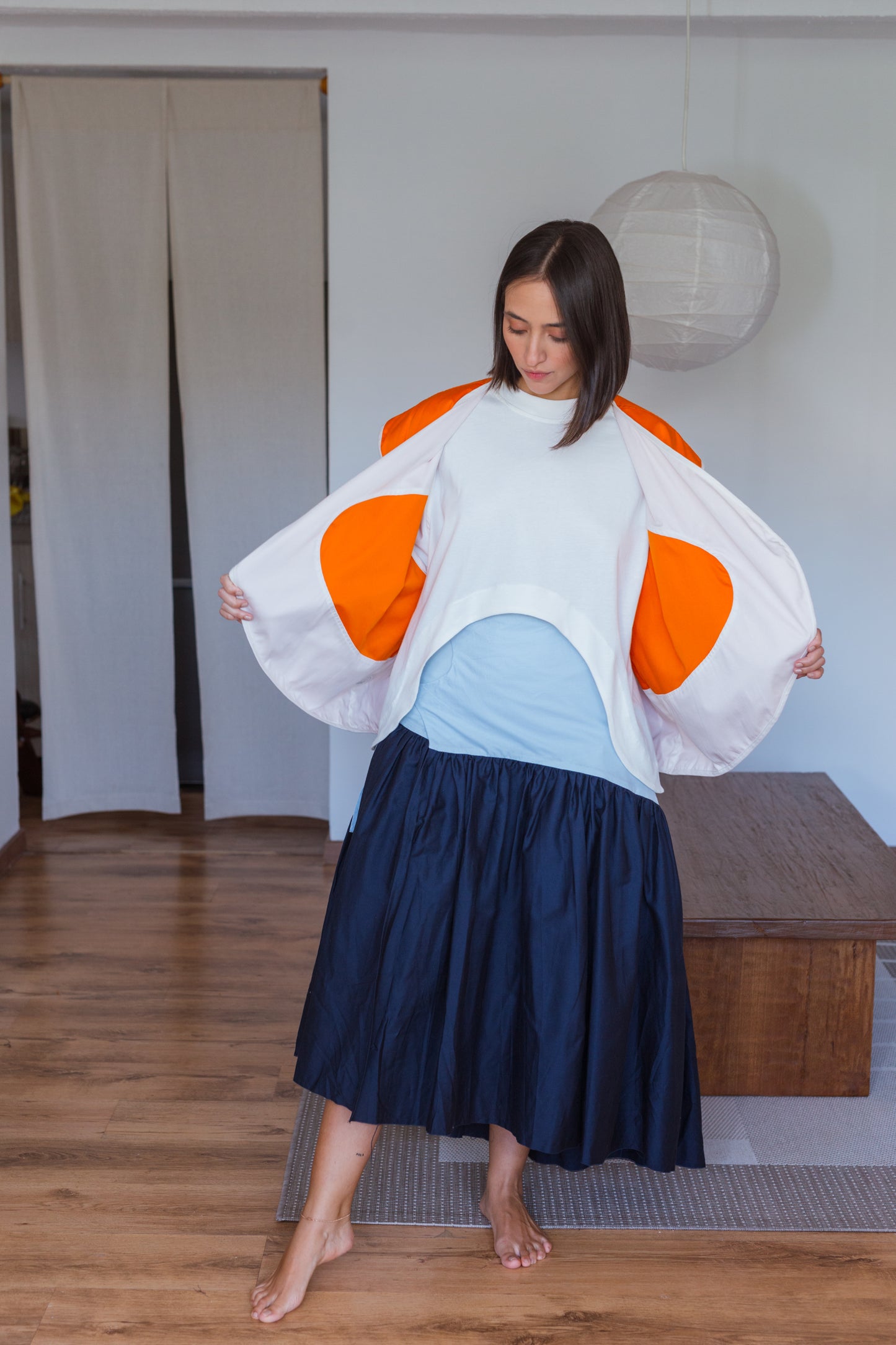 CHALECO HACIA ADENTRO NARANJA